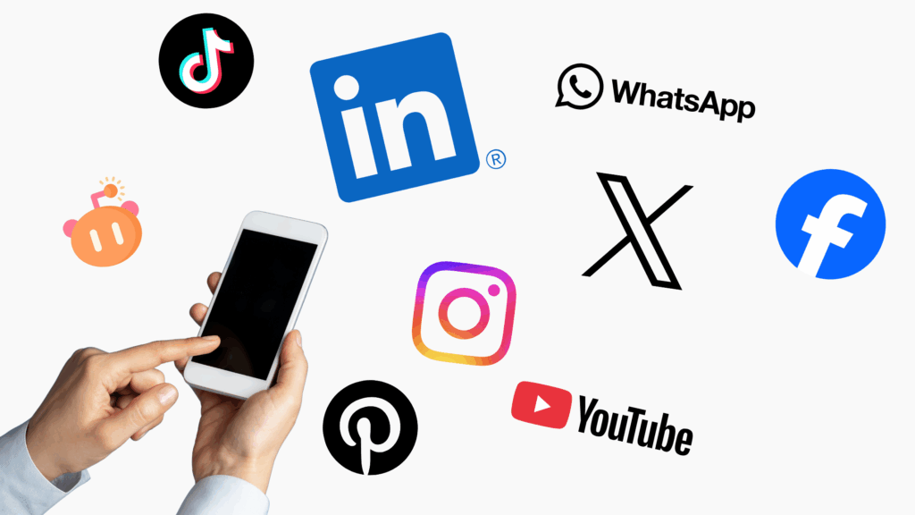 Hands holding smartphone with social media logos surrounding it